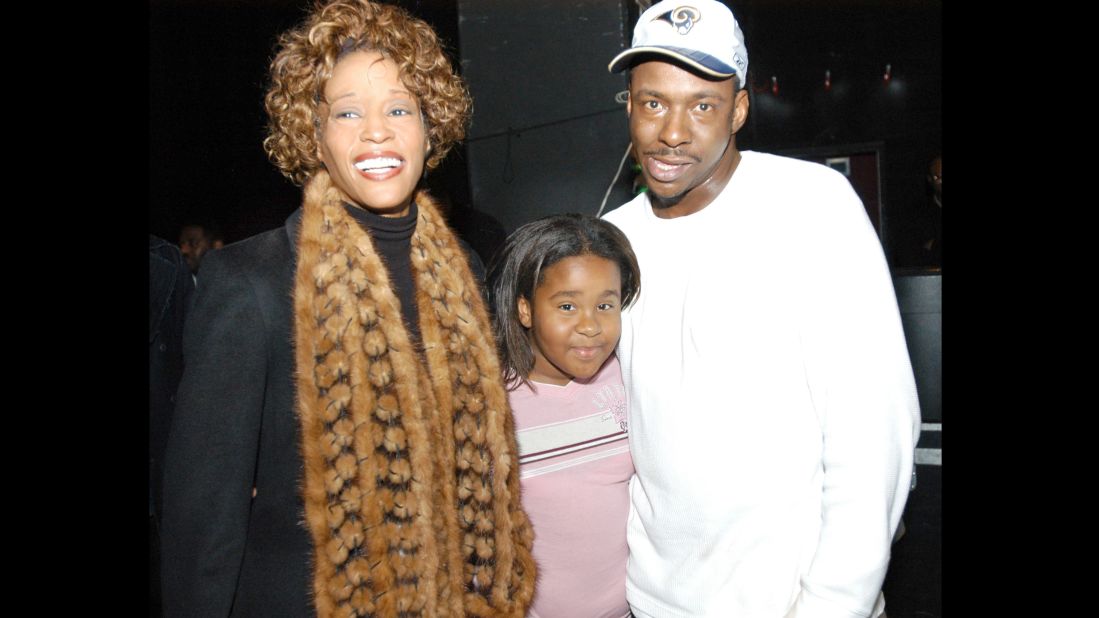 Another photo of Bobbi Kristina with her parents, who separated in 2006 and divorced the next year. 