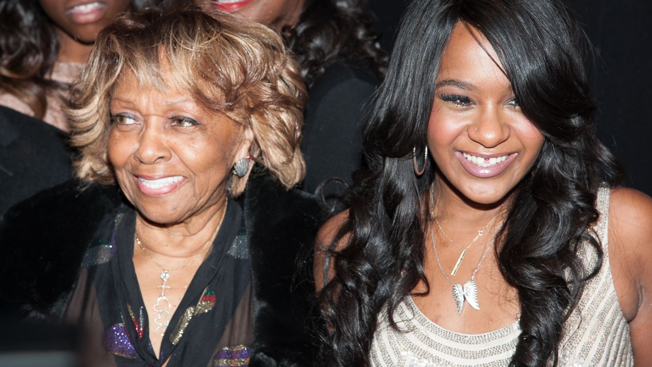 Bobbi Kristina and her grandmother Cissy Houston attend a premiere party for the show in October 2012.