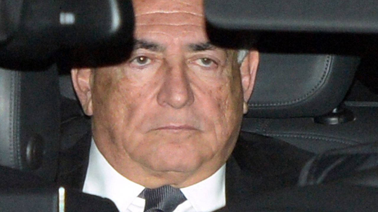 Ex-IMF chief Dominique Strauss-Kahn leaves the Lille courthouse in northern France in February 2015.