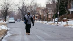 James Robertson, 56, of Detroit, walks toward Woodward Ave. to catch his morning bus to Somerset Collection in Troy before walking to his job at Schain Mold & Engineering in Rochester Hills on Thursday, Jan. 29, 2015 in Detroit. (Ryan Garza/Detroit Free Press/TNS/landov)       Detroit Free Press/ TNS /LANDOV