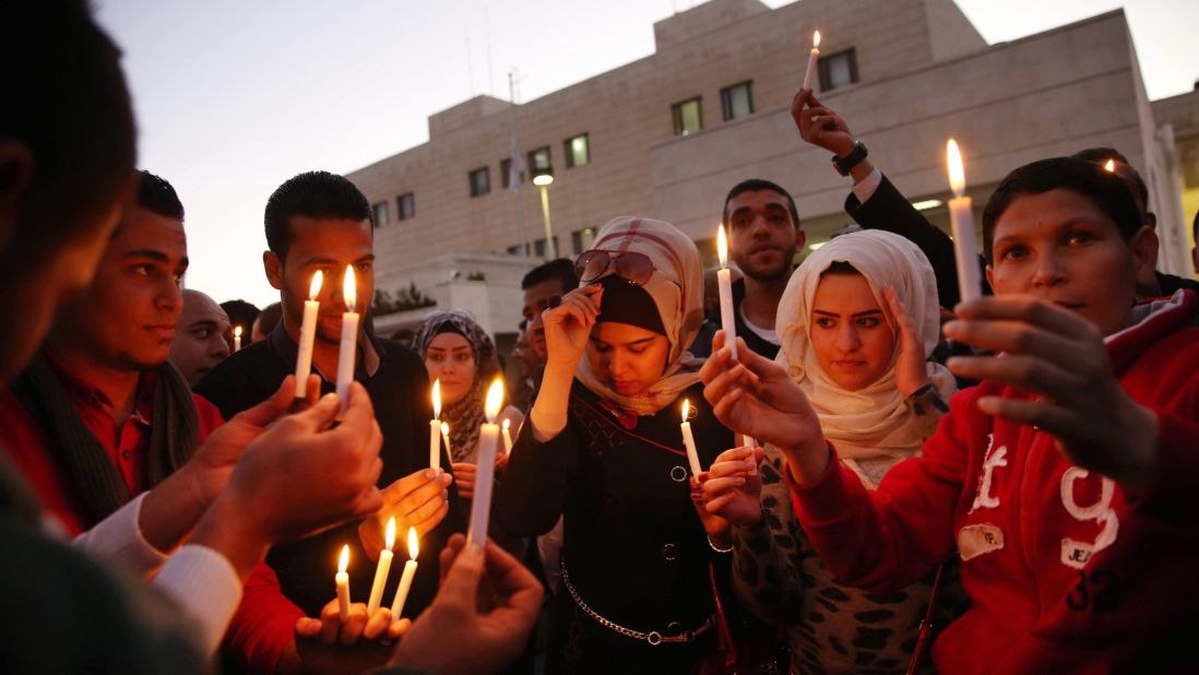 Jordanian youth gather for a candlelight vigil February 2 in Amman to condemn the killing of the two Japanese hostages.