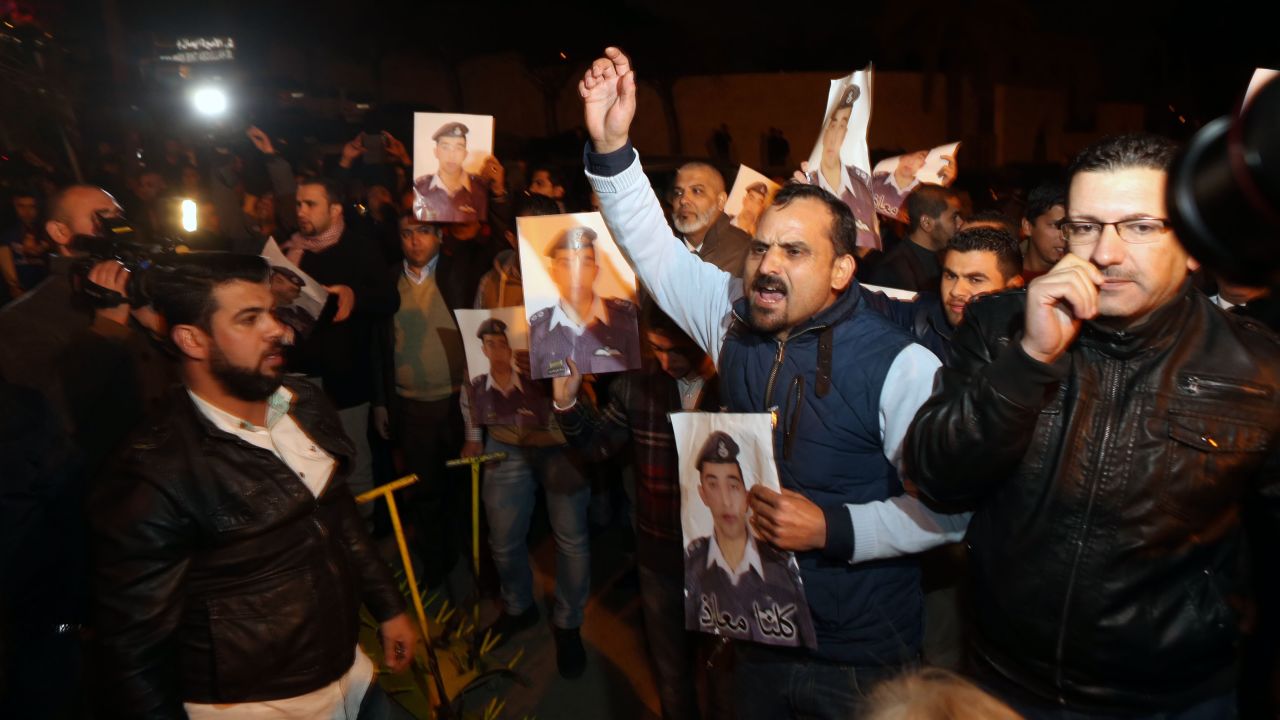 Angry relatives of al-Kasasbeh protest at the entrance to Jordan's royal palace in Amman on Wednesday, January 28.