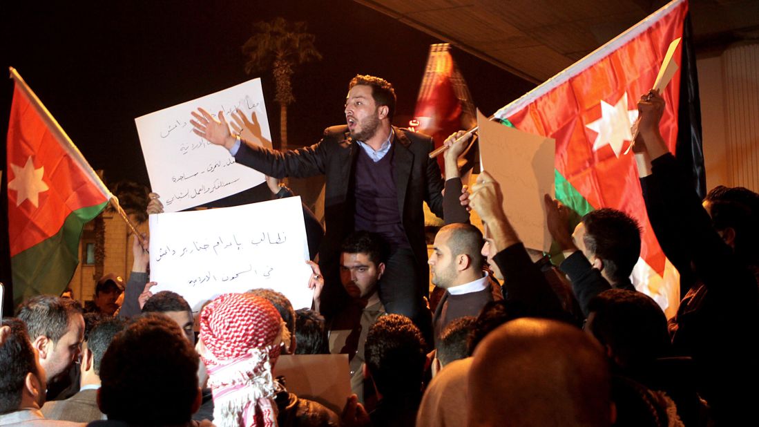 Jordanians gather in Amman on Tuesday, February 3, after reports that al-Kasasbeh had been killed.