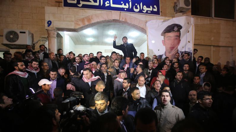 Supporters and family members of al-Kasasbeh gather in Amman after reports of his death on February 3.