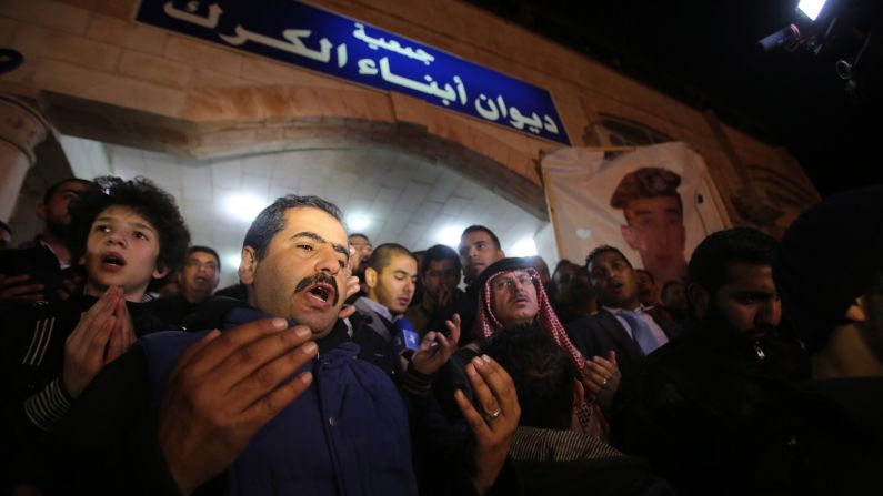 Supporters and family members say prayers on February 3.