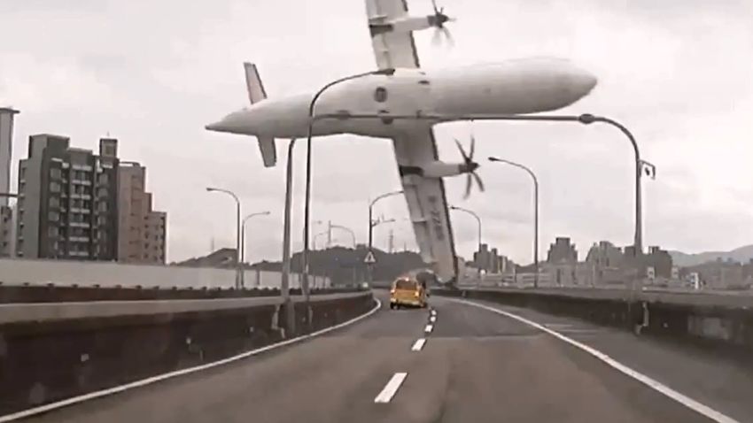 TOPSHOTS
TAIWAN OUT
This screen grab taken from video provided courtesy of TVBS Taiwan on February 4, 2015 shows a TransAsia ATR 72-600 turboprop plane clipping an elevated motorway and hitting a taxi (C) before crashing into the Keelung river outside Taiwan's capital Taipei in New Taipei City. The low-flying passenger plane, TransAsia Flight GE235 with 58 people on board, clipped the bridge and plunged into the river outside Taiwan's capital with at least 11 feared dead and many trapped inside.    TAIWAN OUT  -- AFP PHOTO / TVBS Taiwan
---EDITORS NOTE--- RESTRICTED TO EDITORIAL USE - MANDATORY CREDIT "AFP PHOTO / TVBS Taiwan" - NO MARKETING NO ADVERTISING CAMPAIGNS - DISTRIBUTED AS A SERVICE TO CLIENTS - NO ARCHIVESTVBS Taiwan/AFP/Getty Images