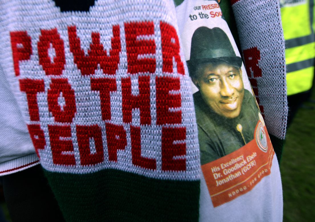 A PDP supporter dons knitwear and a shirt emblazoned with incumbent Goodluck Jonathan's face at a rally on January 28.
