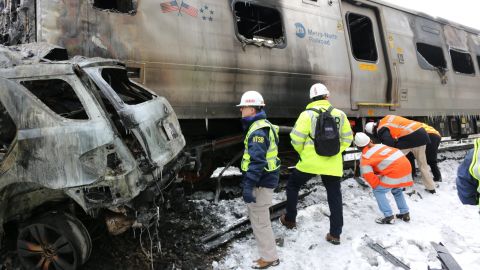 NTSB members at the scene of the Metro-North accident in Valhalla, New York.