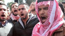 Jordanian students shout slogans during a rally to condemn the killing of Jordanian pilot Maaz al-Kassasbeh, who was killed by Islamic State (IS) group militants after he was captured by IS when his plane went down in Syria in December, at the University of Jordan in the capital Amman on February 4, 2015. Jordan executed two death-row Iraqi jihadists, including a woman, on February 4 after vowing to avenge the burning alive of its fighter pilot Maaz al-Kassasbeh. Jordan had promised to begin executing Islamic extremists on death row in response to the murder of the pilot. AFP PHOTO / STRSTR/AFP/Getty Images