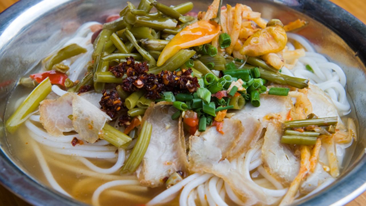 Guilin isn't only famous for its heavenly landscape, but also bowls of rice noodles topped with preserved long beans, peanuts, bamboos shoots and spring onions.