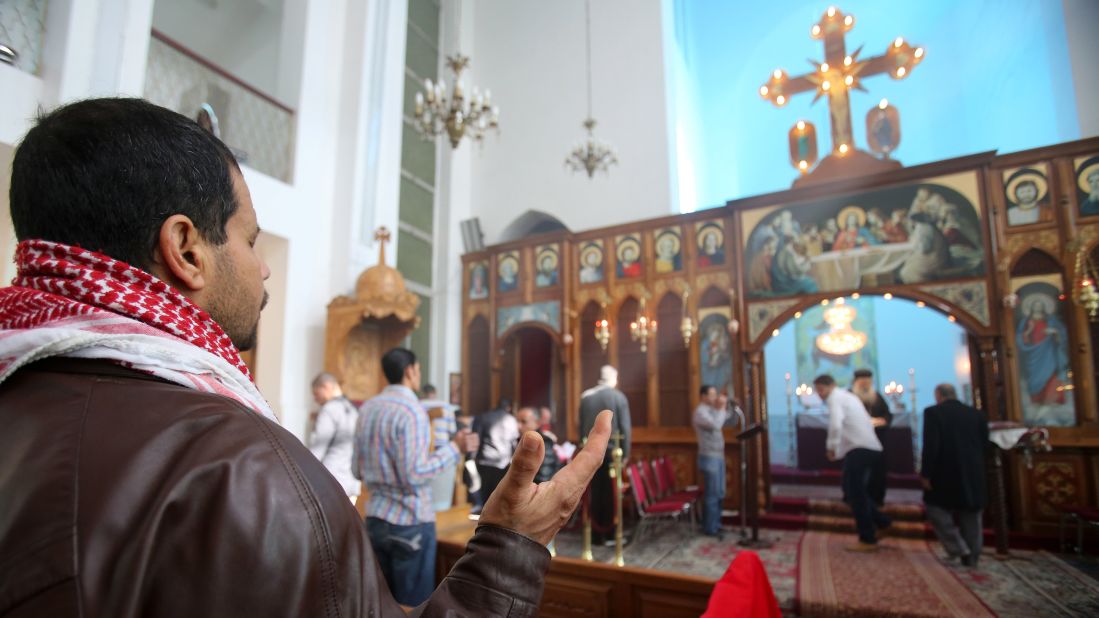 Jordanian Christians in Amman pray during a Mass held for al-Kasasbeh on February 4.