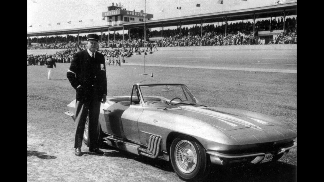Posing with his '63 roadster at Daytona Speedway, Harley Earl shows his love for NASCAR. Daytona eventually named its race trophy after Earl. In this photo, taken around 1964, Earl is wearing a hat given to him by former French President Charles de Gaulle, said grandson Richard Earl.