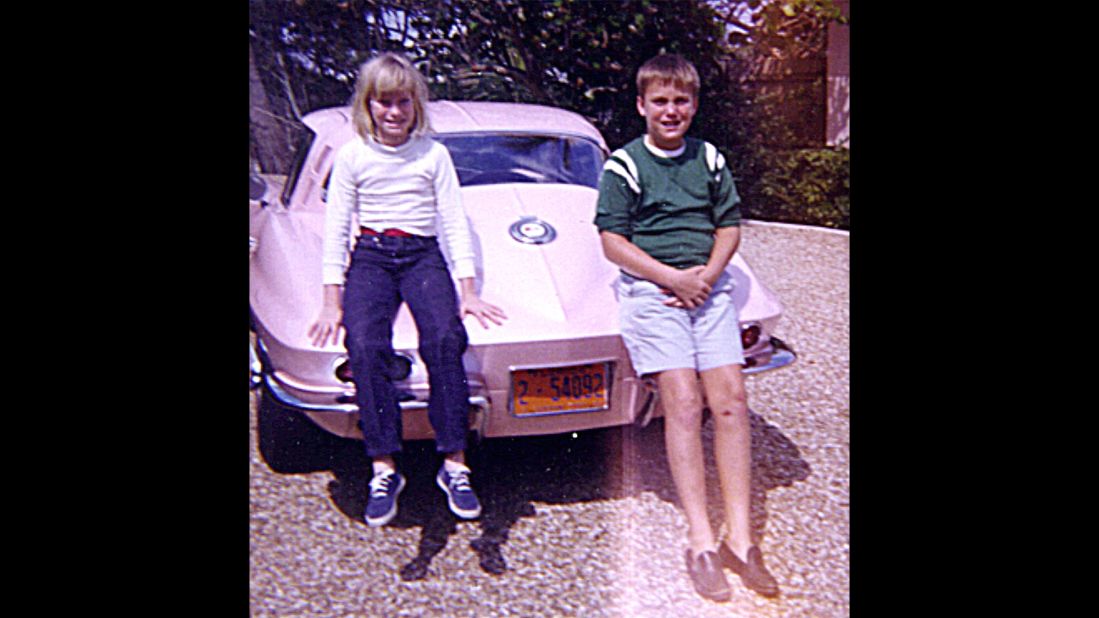 Sue Earl's 1965 Sting Ray and two of her and Harley Earl's grandchildren, Suzie, left, and Courtney, right. 