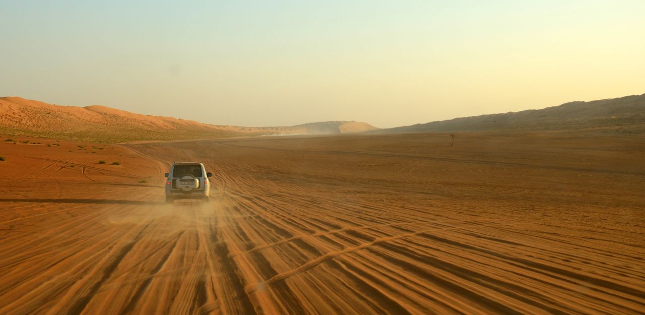 With its massive dunes, multicolored sands, Bedouin and camels, Oman looks like something out of a movie.