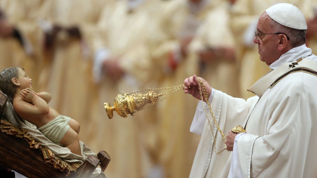 The Pope attends Christmas Eve Mass at St. Peter's Basilica in Vatican City in December 2014.