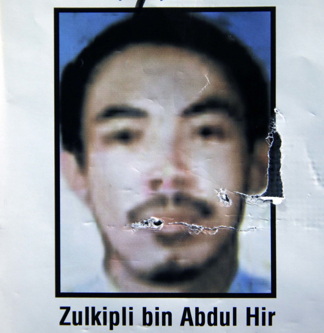 Undated file photo of a Philippine National Police "wanted" poster for Malaysian terrorist Zulkifli bin Hir, known as Marwan.