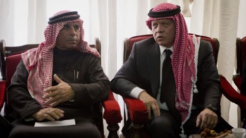Jordanian King Abdullah II, right, talks with Safi al-Kasasbeh, father of slain Jordanian pilot, Lt. Moath al-Kasasbeh, on February 5.