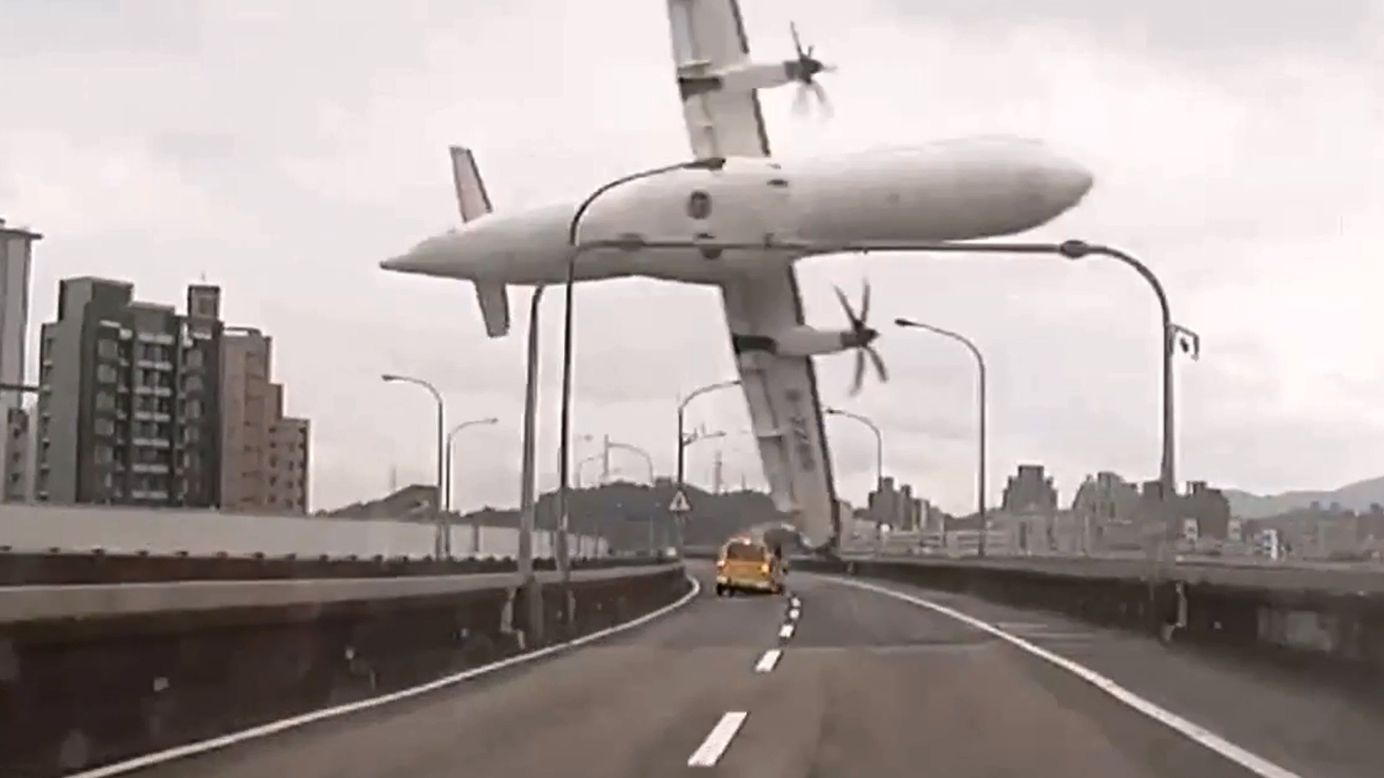 In this still image taken from video, <a href="http://www.cnn.com/2015/02/04/asia/gallery/taiwan-transasia-plane-crash/index.html" target="_blank">TransAsia Airways Flight GE235</a> clips a bridge in Taipei, Taiwan, shortly after takeoff Wednesday, February 4. The twin-engine turboprop airplane then plunged into the Keelung River. More than 30 of the 58 passengers on board have been confirmed dead.