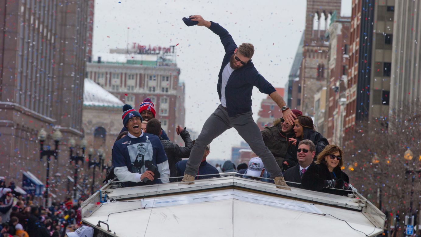 New England Patriots wide receiver Julian Edelman simulates a touchdown spike during the team's victory parade in Boston on Wednesday, February 4. The Patriots defeated the Seattle Seahawks 28-24 in <a href="http://www.cnn.com/2015/02/01/us/gallery/super-bowl-xlix/index.html" target="_blank">Super Bowl XLIX.</a> Edelman caught the game-winning touchdown pass.