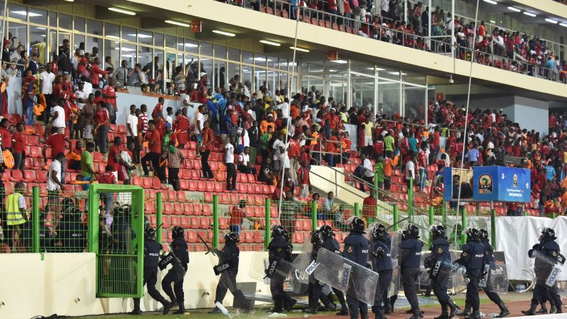 Play was stopped eight minutes from full-time when Equatorial Guinea fans apparently aimed missiles as Ghana supporters.