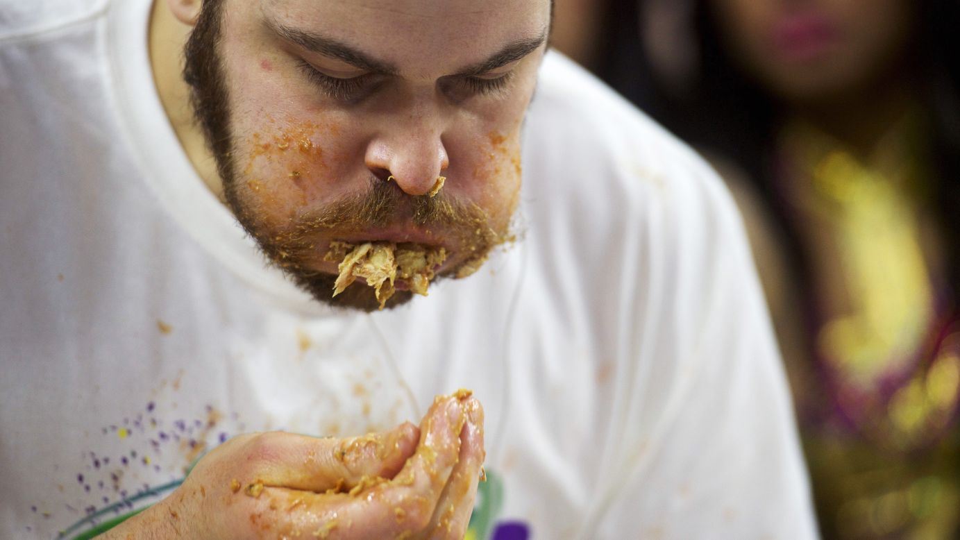 Competitive eater Patrick "Deep Dish" Bertoletti competes in the 23rd annual Wing Bowl, which was held in Philadelphia on Friday, January 30. Bertoletti downed 444 chicken wings in 30 minutes, narrowly edging out his nearest competitor and shattering the record of 363 wings.