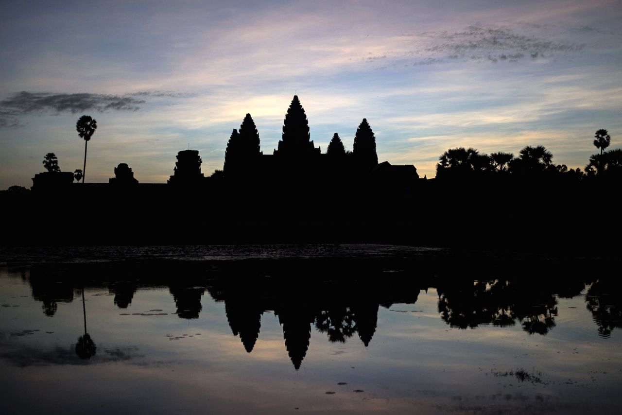 So beautiful, so misunderstood. To get this sunrise shot, you're going to be fighting with a few hundred other tourists, all crowded around Angkor Wat's moat.  