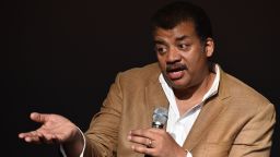 Neil deGrasse Tyson, astrophysicist, 'Cosmos' television show host and Frederick P. Rose Director of the Hayden Planetarium at the American Museum of Natural History speaks August 4, 2014 after a screening of James Cameron's 'Deepsea Challenge 3D' film at the museum in New York. AFP PHOTO/Stan HONDA (Photo credit should read STAN HONDA/AFP/Getty Images)