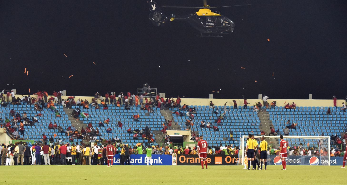 Ghana advanced to the Africa Cup of Nations final after beating Equatorial Guinea 3-0. The game, however, had to be stopped at one point due to crowd trouble that led to a police helicopter intervening.
