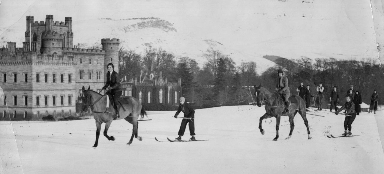 A long established tradition, it is not always about competition. These skiers partake in leisurely fashion back in 1931 at Taymouth Castle in Scotland.
