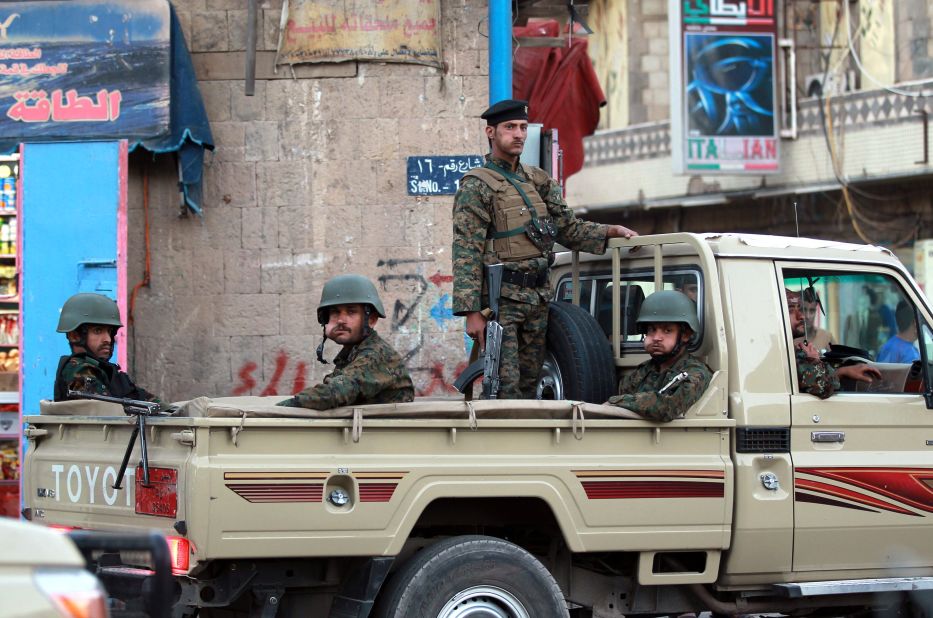 Yemeni soldiers guard the presidential palace in Sanaa on Friday, February 6.