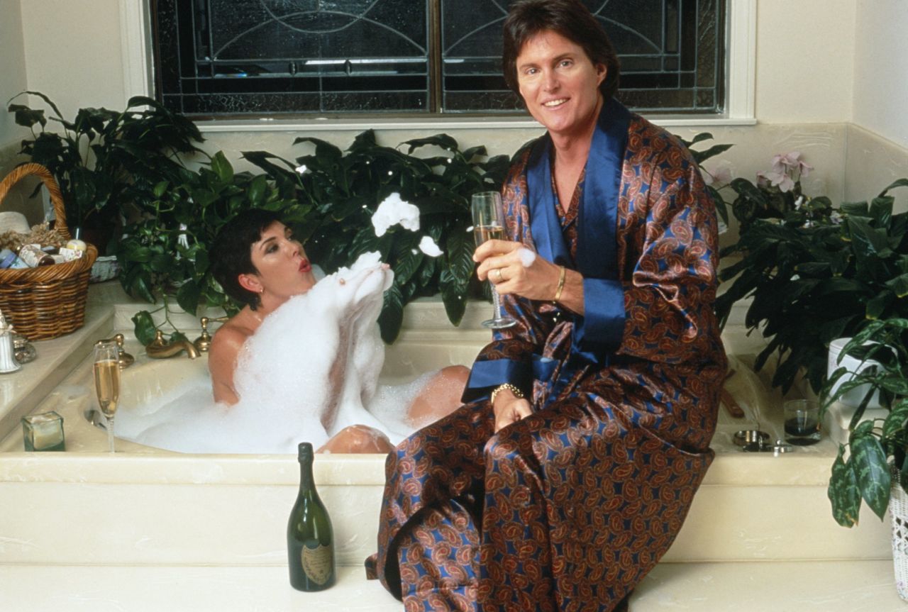 The Jenners share a bottle of champagne over a bubble bath.