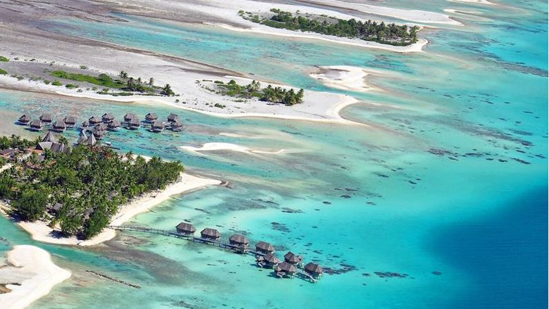 This teardrop-shaped atoll in the <a  target="_blank" target="_blank">Tuamotu Archipelago</a> is a throwback to the French Polynesia of 50 years ago. Coconut palms shade pink-sand beaches on tiny islands (motus) scattered around the outer edge of a fish-filled lagoon.<br /><strong>Romantic rush: </strong>A kayak paddle to your own uninhabited isle.<br /><strong>Hot hotel: </strong><a  target="_blank" target="_blank">Tikehau Pearl Beach Resort</a>, Motu Tiano, Tuamotus, Tahiti; +689 4050 8445