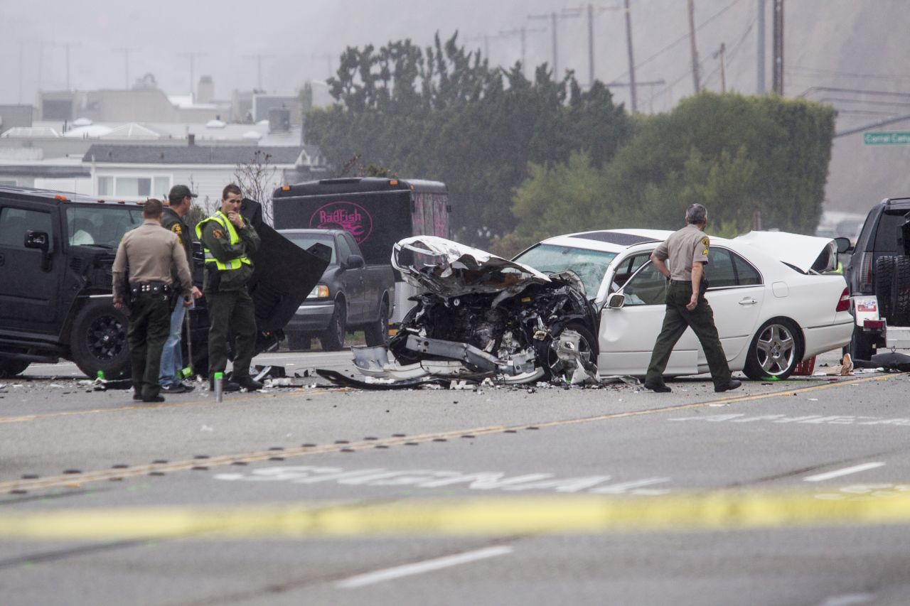 Members of the Los Angeles County Sheriff's Department work the wreck scene. Jenner was the driver of one vehicle, Deputy Ray Hicks told CNN.<br />