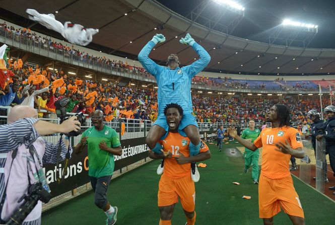 Ivory Coast hero Boubacar Barry is lifted on the shoulders of Wilfried Bony after his team's victory in the Africa Cup of Nations final over Ghana. Barry scored the winning penalty in the 9-8 shootout win.