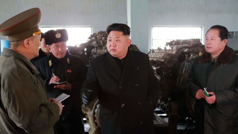 This undated picture from North Korea's state media on February 8, 2015 shows North Korean leader Kim Jong Un inspecting the October 3 Dockyard under Korean People's Army Navy Unit 597 at undisclosed place in North Korea.