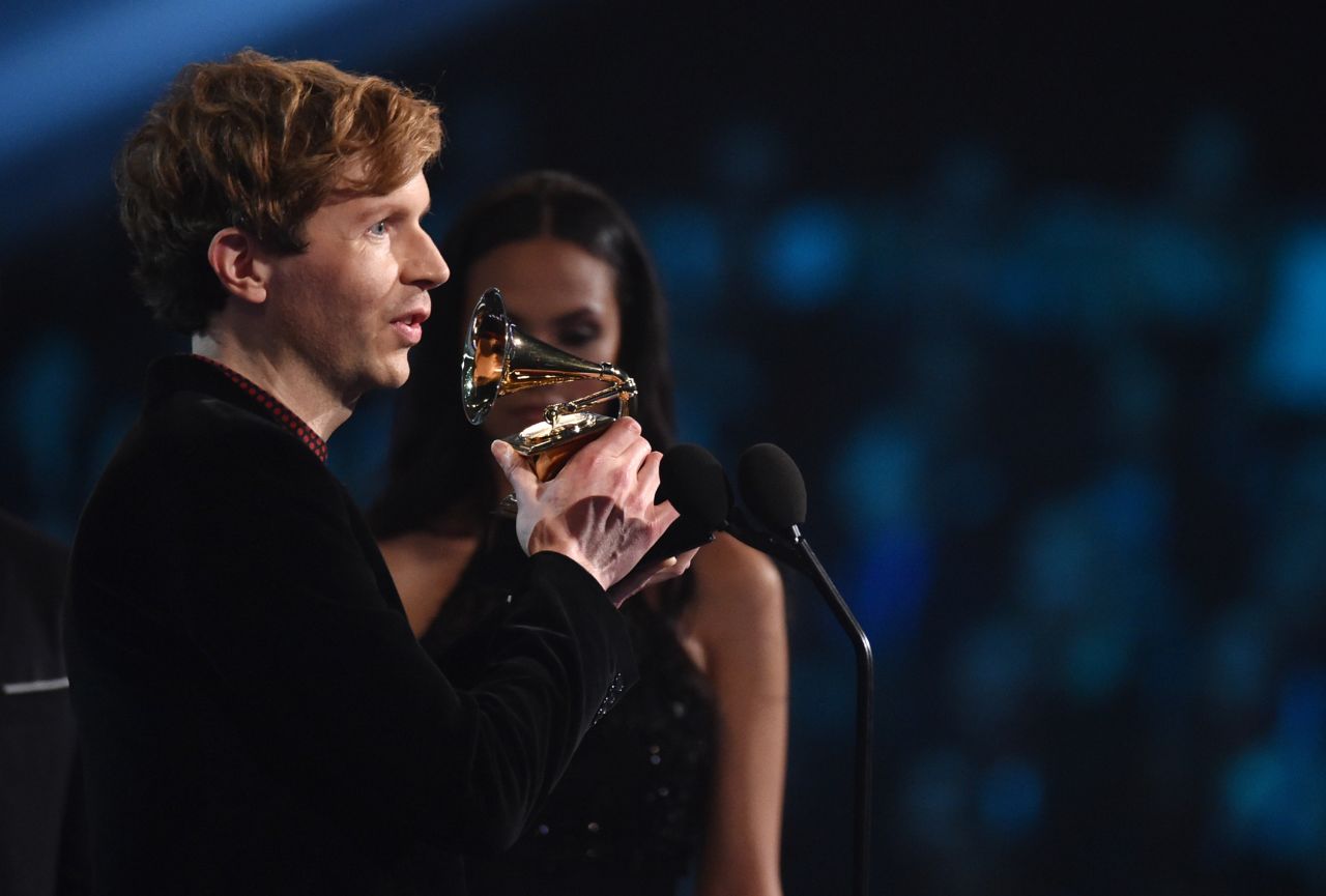 Beck receives the Grammy for Best Rock Album. His "Morning Phase" was also named Album of the Year.