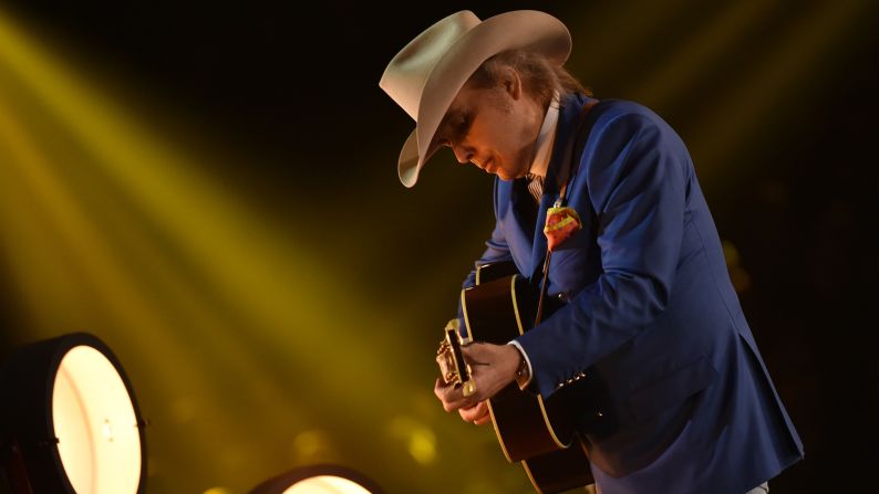 Dwight Yoakam performs with Brandy Clark on Clark's song "Hold My Hand."