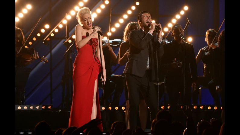 Gwen Stefani and Adam Levine sing "My Heart Is Open."