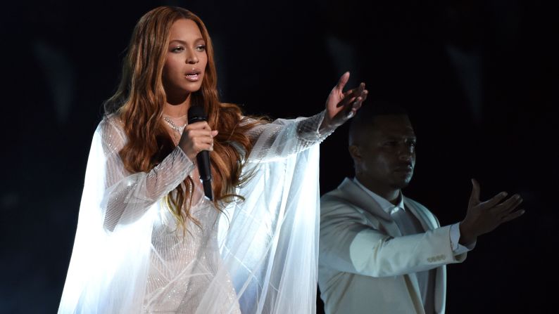 Beyonce sings the gospel song "Take My Hand, Precious Lord."