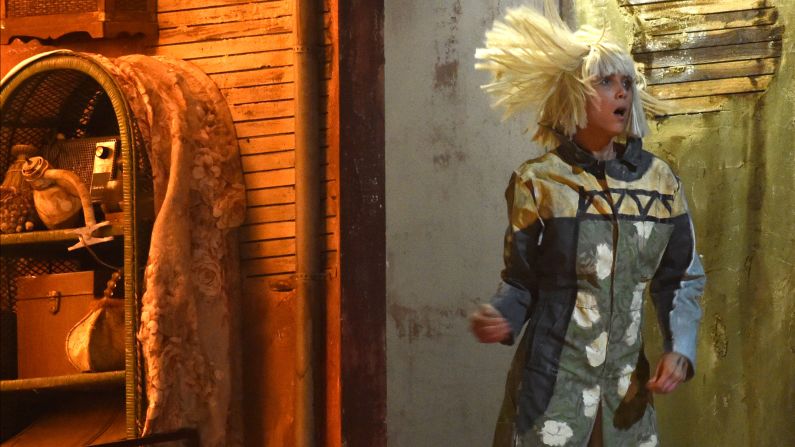 Actress Kristen Wiig performs while Sia sings her song "Chandelier."