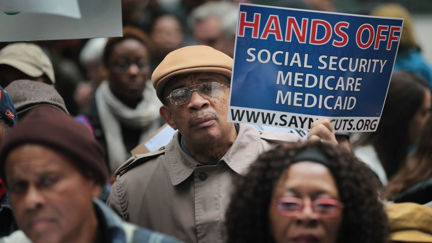 Demonstrators protest against cuts to federal safety net programs on November 7, 2011, in Chicago. 