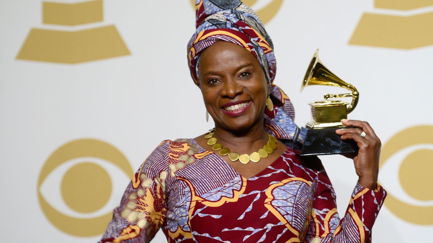 Angelique Kidjo celebrates her win for "Best World Music Album" at the 57th Annual Grammy Awards at the Staples Center on February 8, 2015 in Los Angeles, California. 