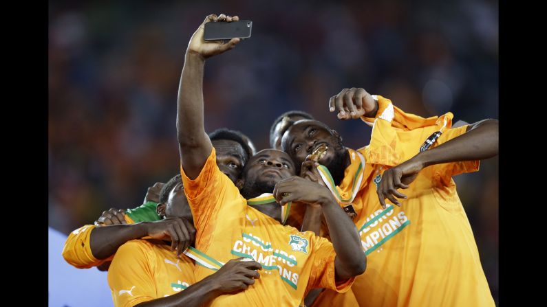 Ivory Coast soccer players take a selfie as they celebrate winning the Africa Cup of Nations on Sunday, February 8. "The Elephants" defeated Ghana in a penalty shootout after the final finished 0-0 in Bata, Equatorial Guinea.