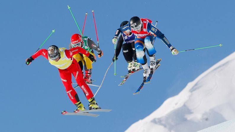 Freestyle skiers race during a World Cup event in Arosa, Switzerland, on Saturday, February 7.