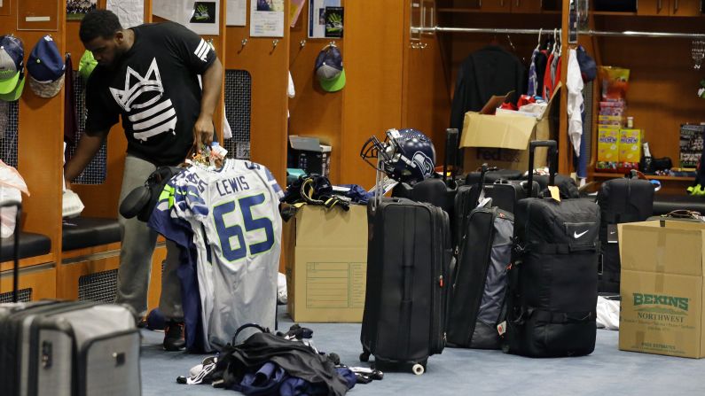 Seattle Seahawks center Patrick Lewis packs up his jerseys and other items Tuesday, February 3, at the team's locker room in Renton, Washington. <a href="index.php?page=&url=http%3A%2F%2Fwww.cnn.com%2F2015%2F02%2F03%2Fsport%2Fgallery%2Fwhat-a-shot-0203%2Findex.html" target="_blank">See 35 amazing sports photos from last week</a>