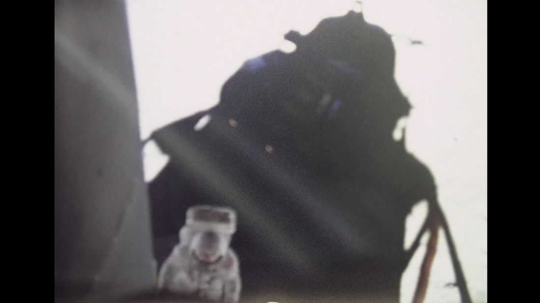 This image of the lunar module's shadow and astronaut was captured by the Apollo 11 data acquisition camera.