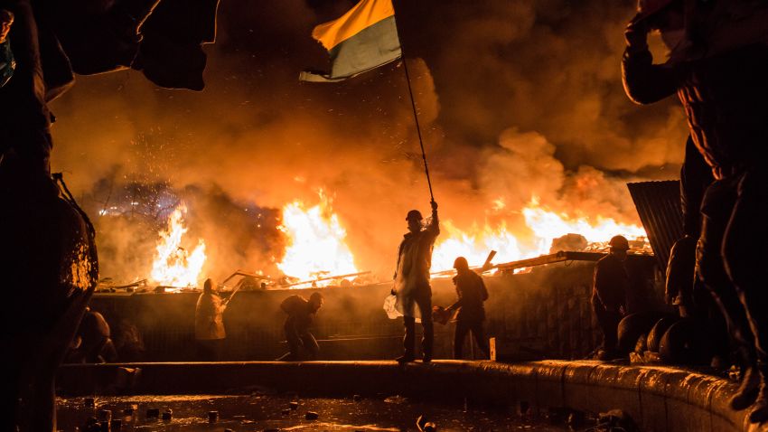 Anti-government protesters guard the perimeter of Maidan Square on February 19, 2014 in Kiev, Ukraine.