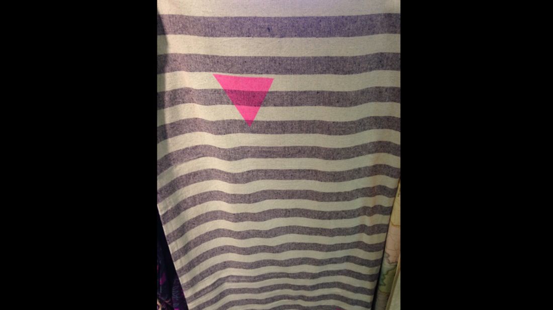 The Anti-Defamation League says a tapestry embellished with a pink triangle, sold in Urban Outfitters stores, looks like uniforms that prisoners were forced to wear during the Holocaust. The group has asked the retailer to pull the product.
