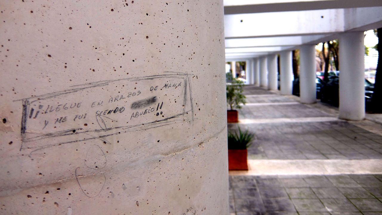 Graffiti on the columns outside the former Canadian pavilion.