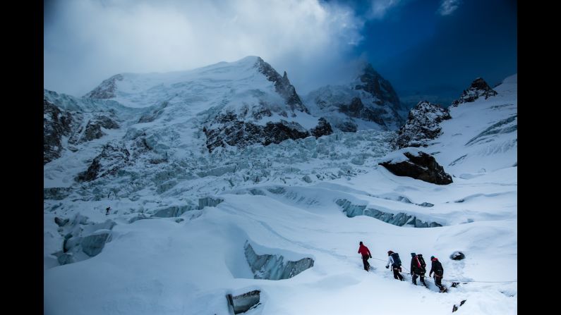 Guides help "The Wonder List" crew navigate some steep crevices below Mont Blanc in the French Alps.